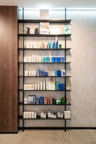 Bathroom with Shelves Full of Cosmetic Products