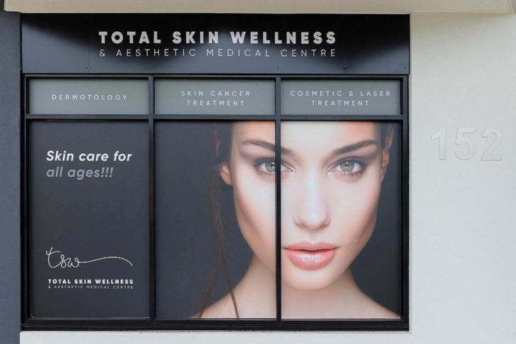Total Skin Wellness - Banner View from the Outside Providing Detailed Information including a Portrait of a Lady