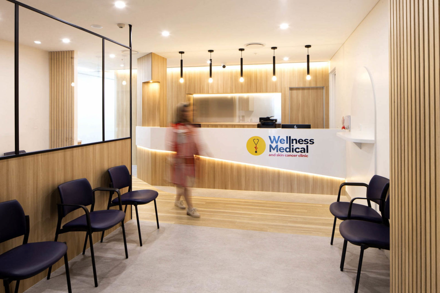 Contemporary Reception Design at Wellness Medical and Skin Cancer Clinic in Springfield Central, Queensland - Featuring Natural Stone, Oak Timber, and LED Lighting