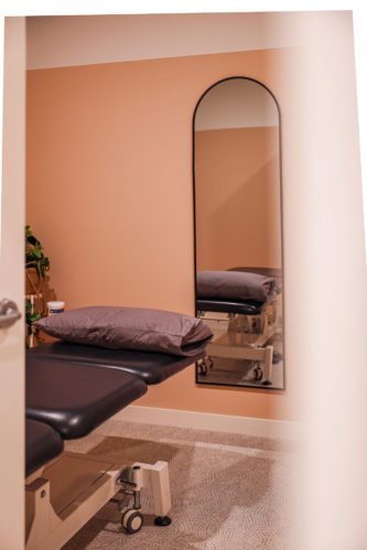 Refine Physiotherapy - Black Arched Mirror with Black Physio Bed