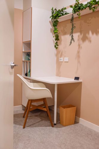 Refine Physiotherapy - Desk, Chair, and Shelf in a Modern Office Setting, showcasing Functional and Stylish Workspace Furniture