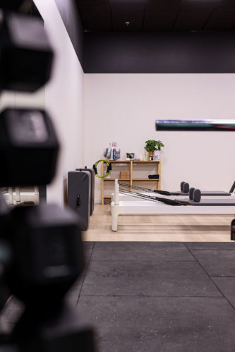 Refine Physiotherapy - Reformer Bed in Gym Equipment Room: A Versatile Exercise Equipment for Pilates and Rehabilitation
