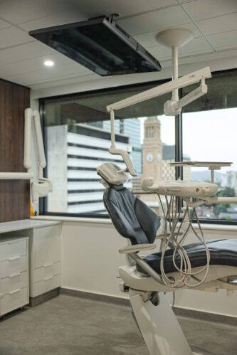 A Dental Chair in a Room with a View of a City