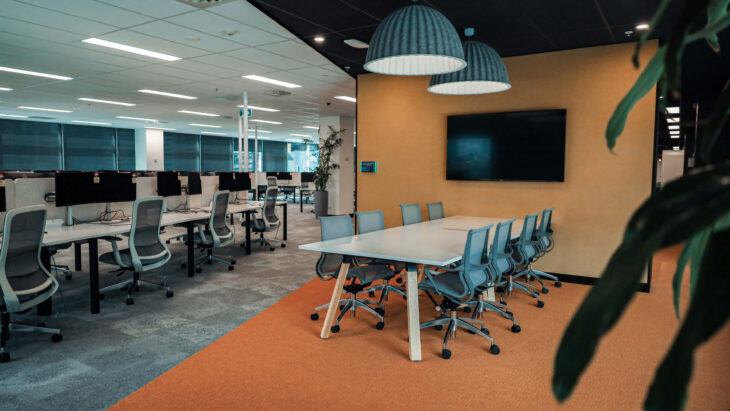 Bright and vibrant orange-themed office space